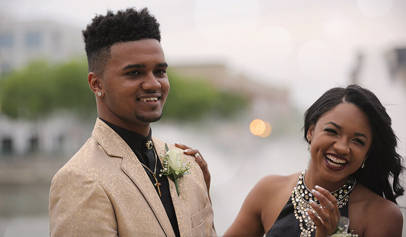 teenagers smiling at their prom